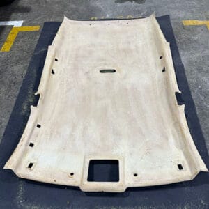 Roof Lining Restoration Processing - After thoroughly removed the melted foam and glue left on the roof board the surface is free of oil, and everything is completely cleaned