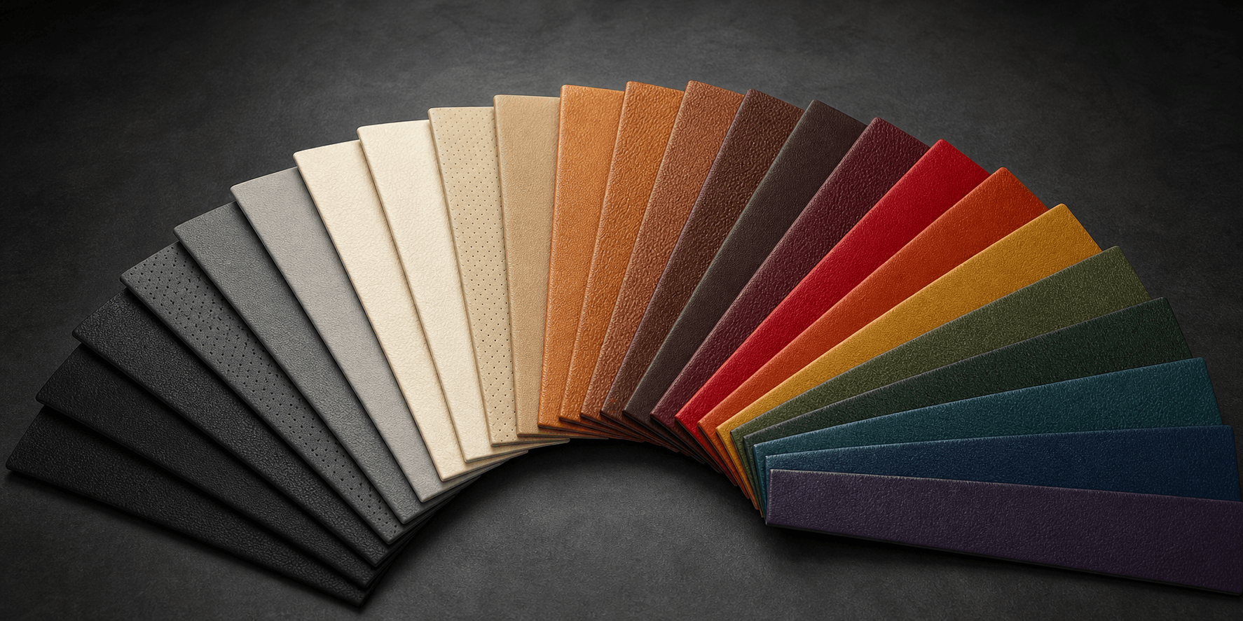 Automotive leather colour swatches showing neutral, brown, red, blue and green upholstery options