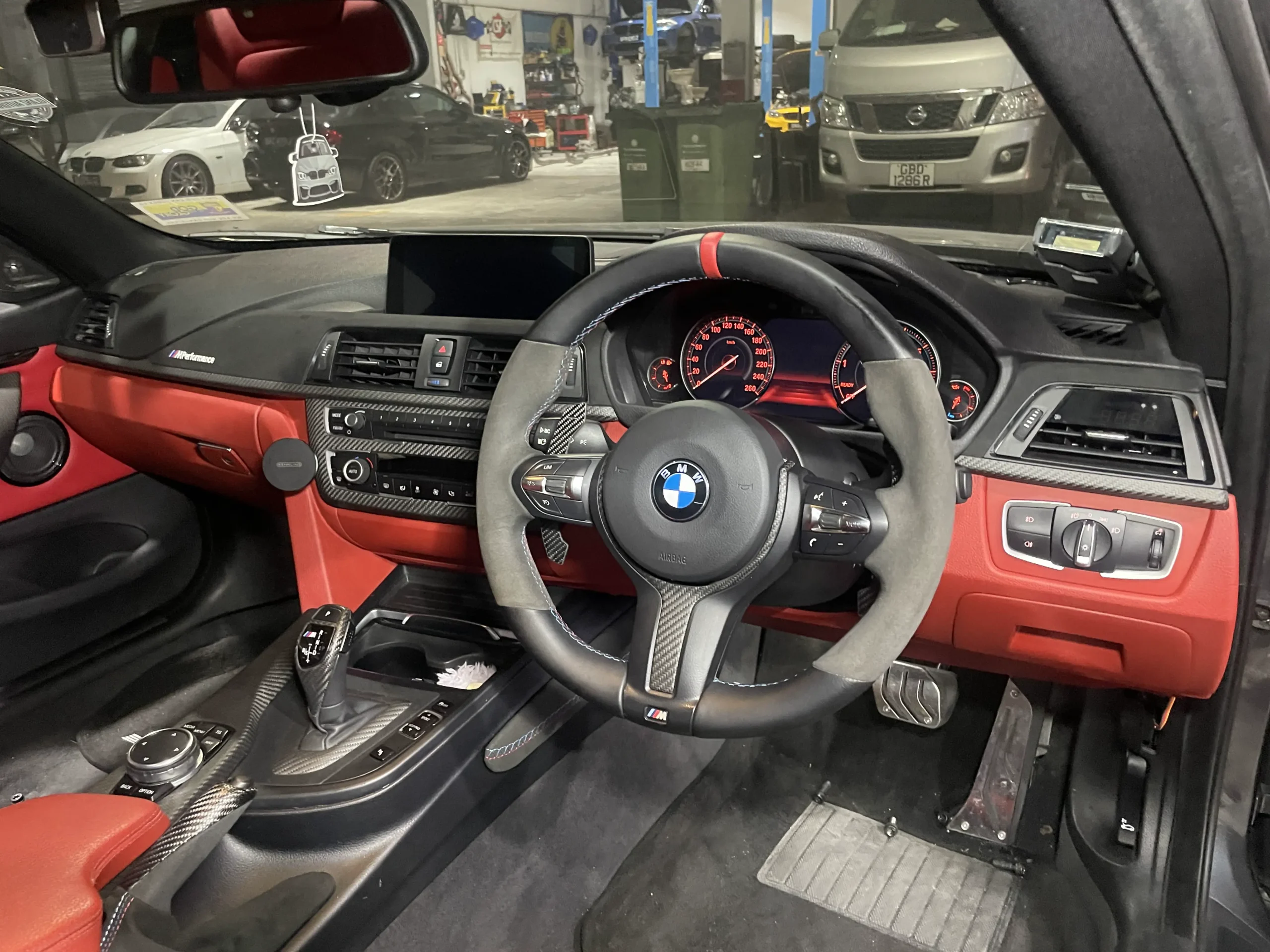 BMW 435i F32 cockpit with red leather dashboard and interior trim