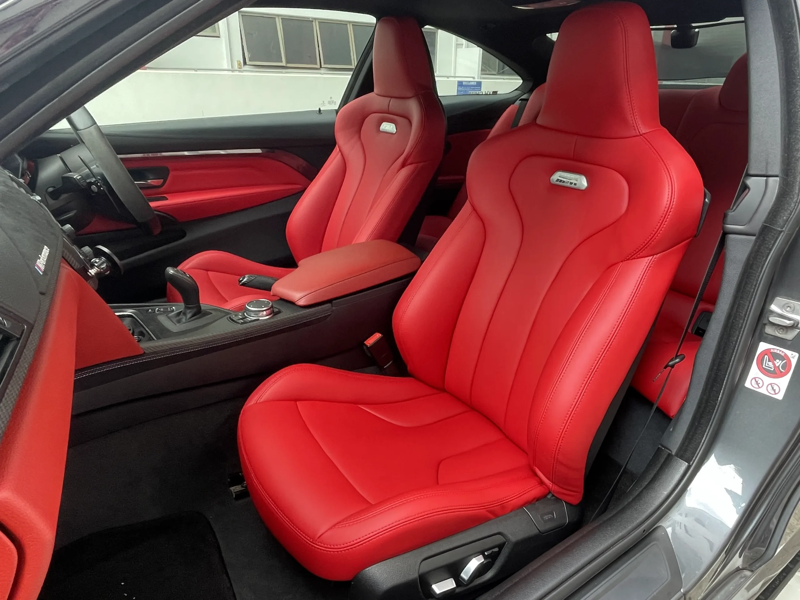 BMW 435i F32 front seats upholstered in red leather