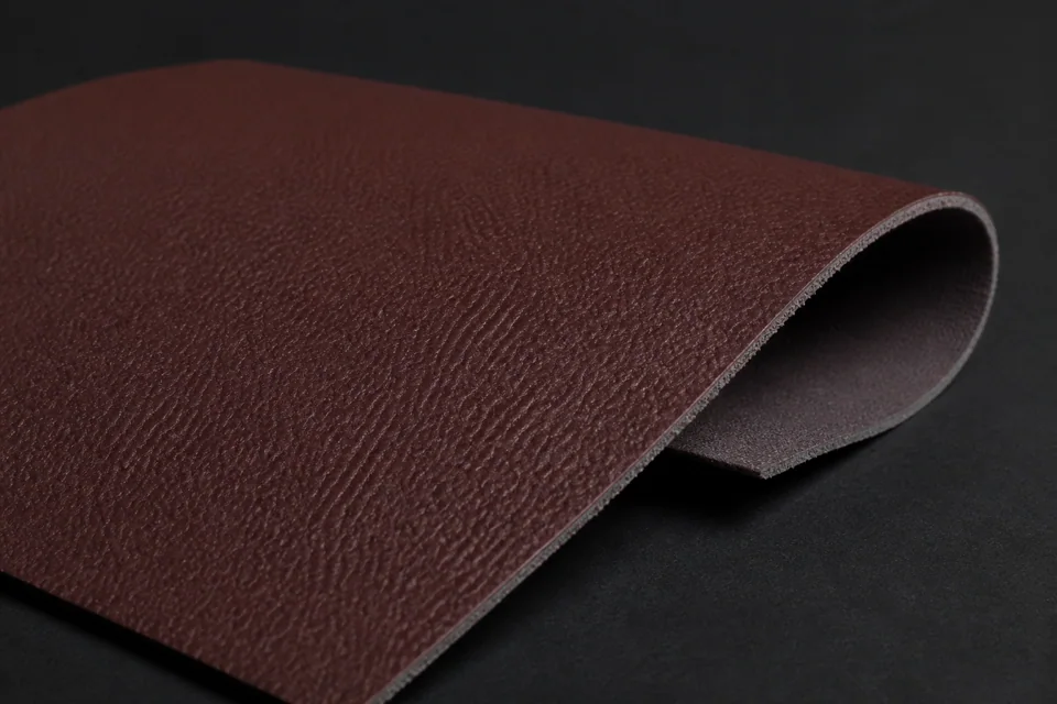 Chestnut PU artificial leather sample for automotive seat upholstery