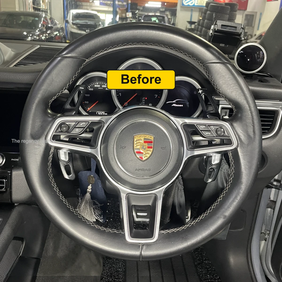 Worn and peeling Porsche Macan steering wheel leather before restoration Singapore