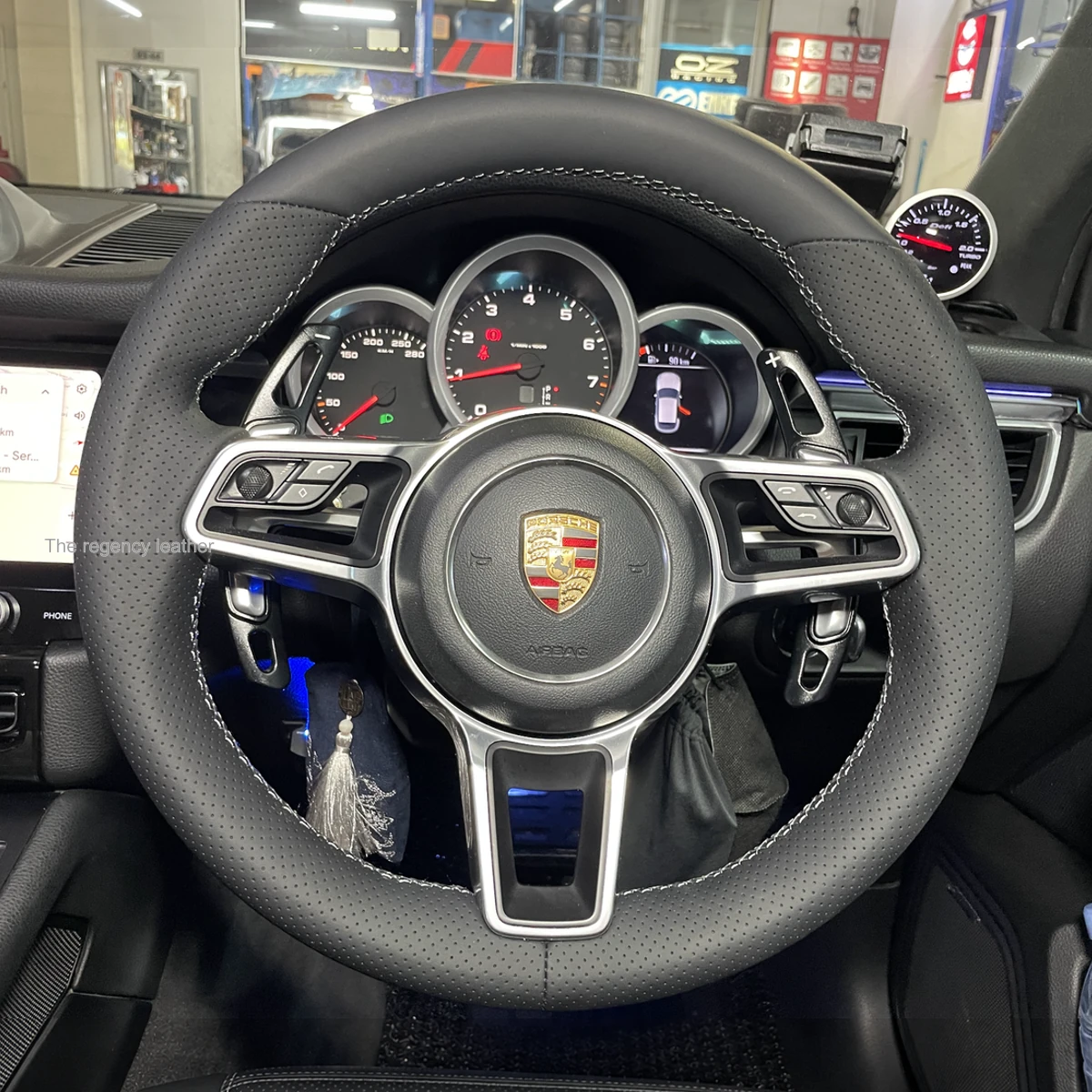 Restored Porsche Macan Agate Grey Nappa steering wheel retaining OEM airbag and paddle shifters