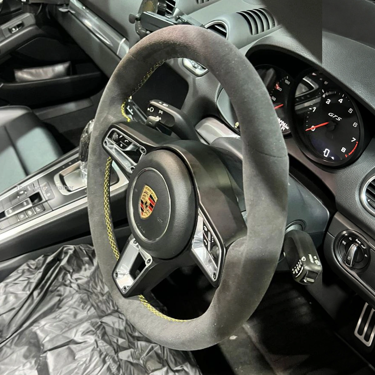 Porsche 718 Cayman GTS 4.0 full Alcantara steering wheel with Racing Yellow cross-stitching side view
